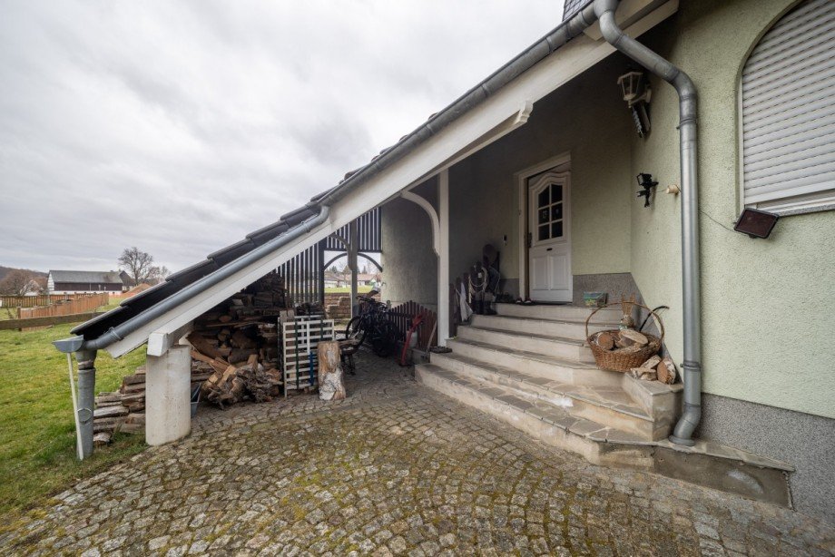 verl�ngertes Dach als Carport Einfamilienhaus H�ckendorf